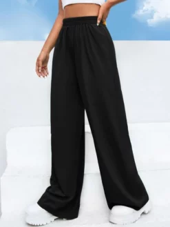 COZZY - Pantalon large en noir sans poches et cordon, en noir